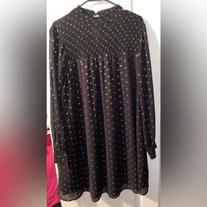 Dressy casual black and gold top.